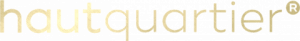 Das Bild zeigt das Wort „hautquartier“ in Kleinbuchstaben in Gold auf schwarzem Hintergrund. In der oberen rechten Ecke des letzten Buchstabens befindet sich ein kleiner goldener Stern.